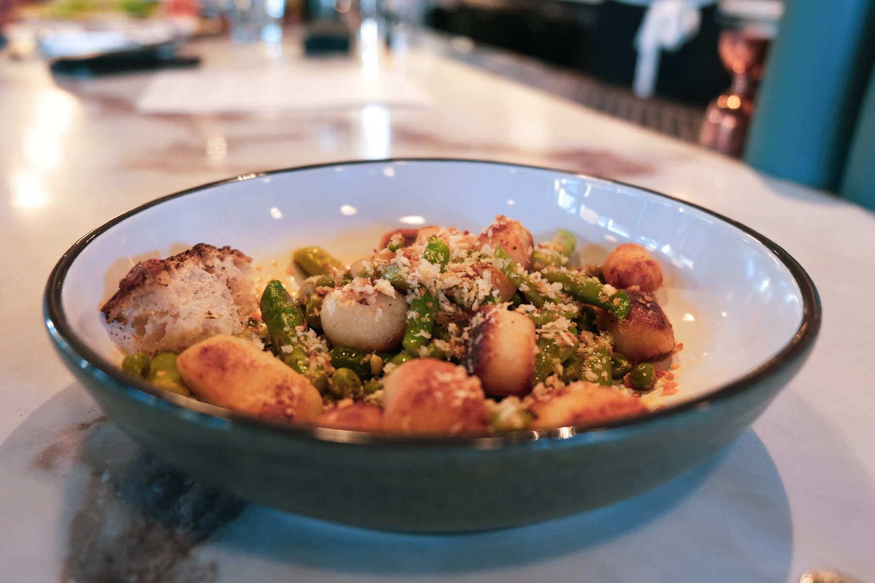 Pillowy gnocchi with asparagus and toasted breadcrumbs
