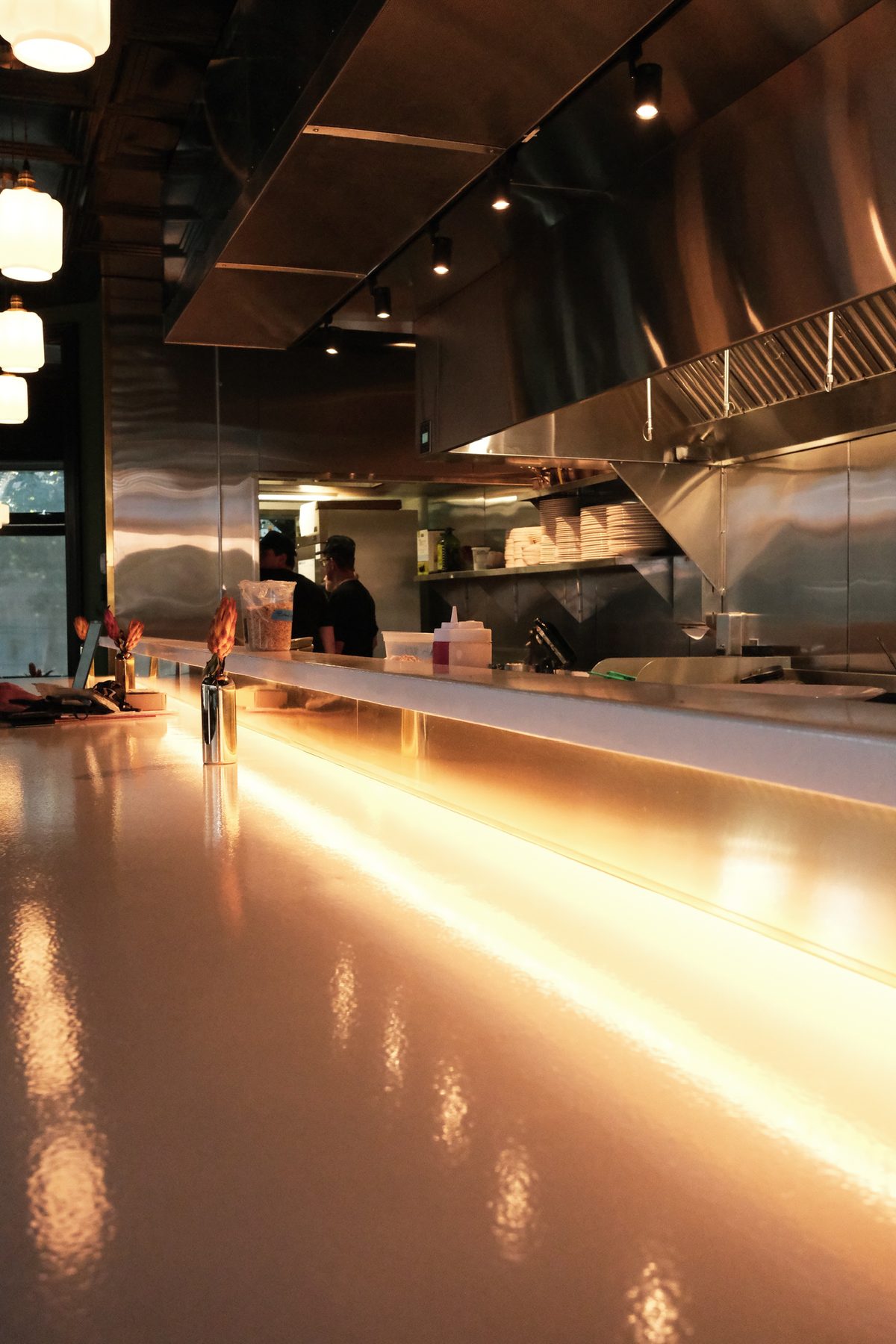 The open kitchen pass at Olive & May
